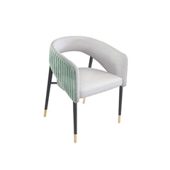 Green velvet upholstered accent chair with sleek metal legs, modern and sophisticated