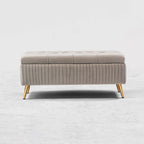 Modern gray velvet storage bench with gold legs for elegant decor