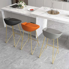 Contemporary PU leather bar stool with stunning gold finish and convenient footrest