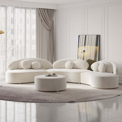 Modern round sectional 7-seat sofa set in beige velvet upholstery with ottoman and decorative pillows