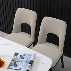 Modern orange dining chair with loop backrest armless design for comfortable seating