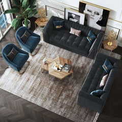 Modular velvet couch with deep gray tufted upholstery