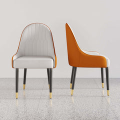 Chic set of 2 white and orange dining chairs with metal legs, upholstered in PU leather for modern dining ambiance