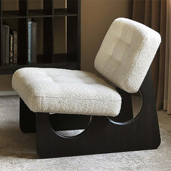 Stylish ash wood upholstered lounge chair with modern boucle sherpa cushion