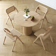 Folding dining chair with Japandi natural design crafted from solid wood and rattan