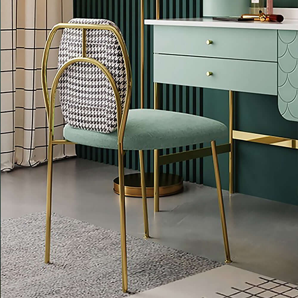 Modern armless dining chair with gold metal legs, elegant side chair for contemporary dining room decor