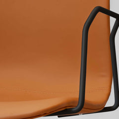 Modern brown office chair with swivel base, PU leather upholstery, and supportive backrest