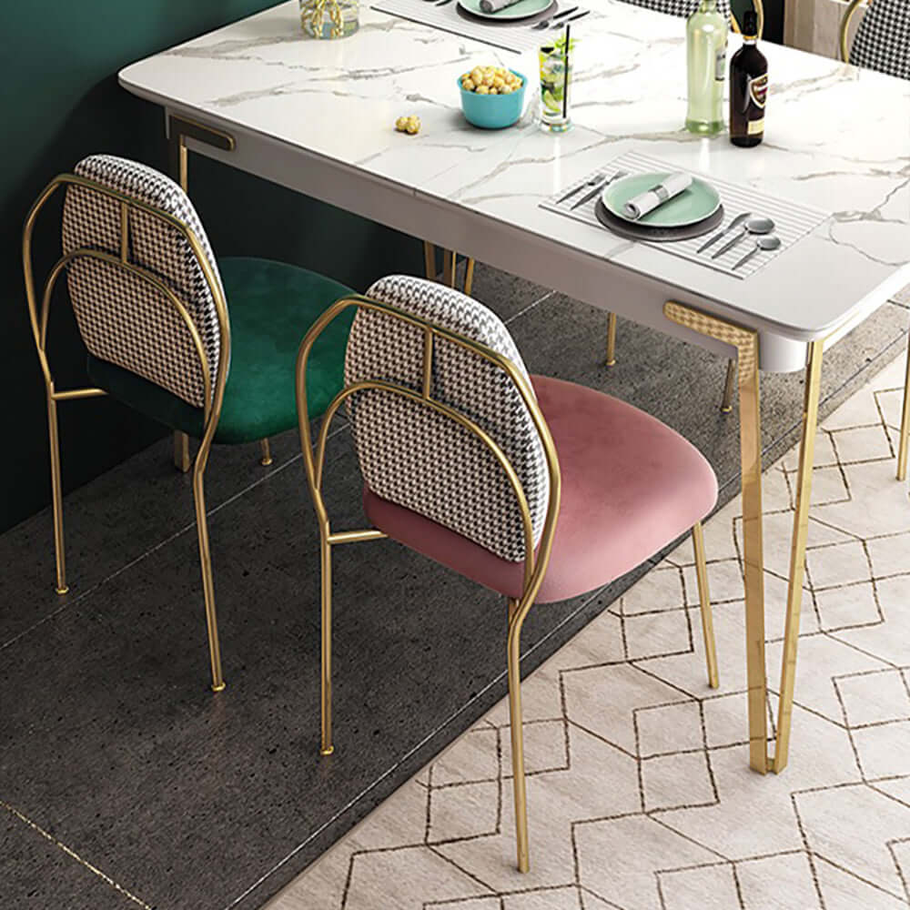 Stylish armless dining chair with shiny gold metal legs, ideal side chair for modern dining room setting