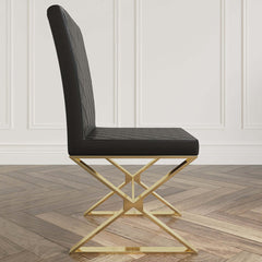 Stylish set of 2 upholstered dining chairs in black leather with radiant gold legs - modern design