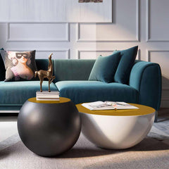 Modern white round drum coffee table with hollow interior storage and yellow top