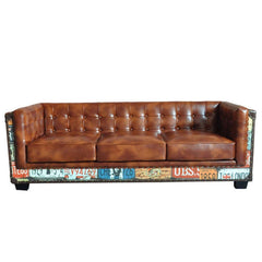 Brown faux leather sofa with vintage industrial loft design and tufted detail