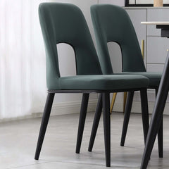 Modern orange dining chair with loop backrest armless design for comfortable seating