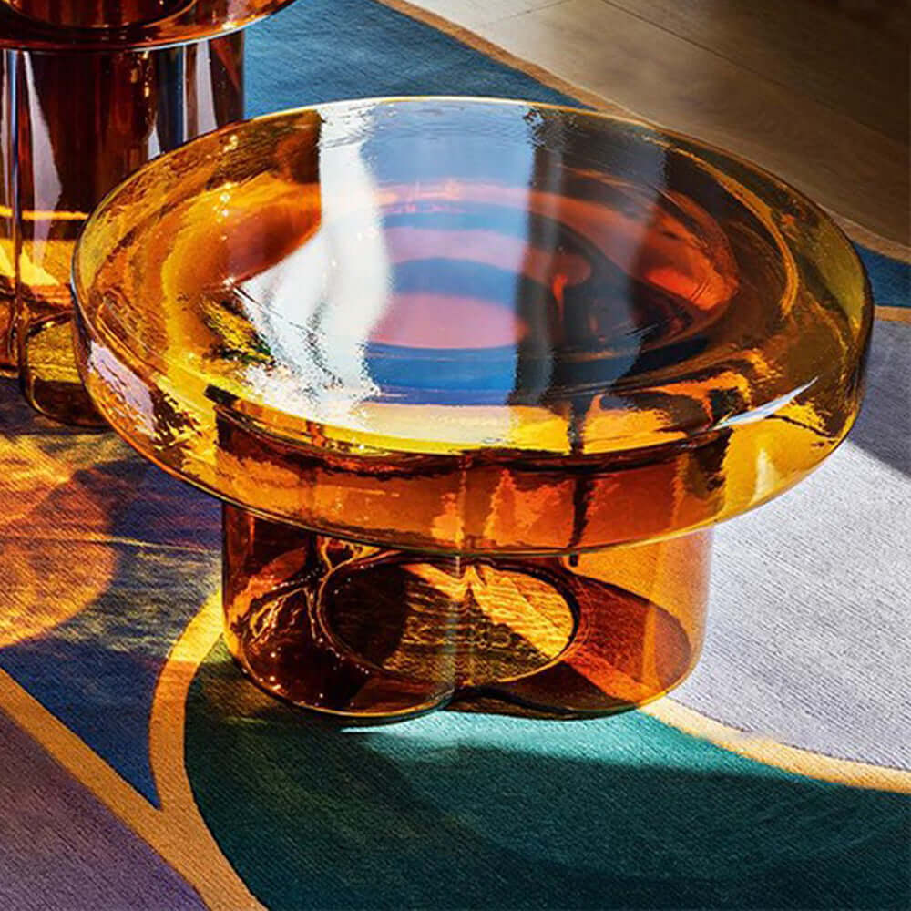 Cloud-shaped modern glass coffee table set with two pieces in vibrant orange, green, purple, and black