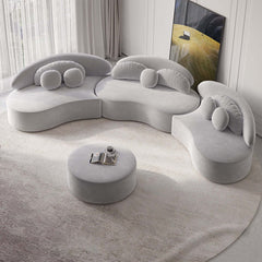 Contemporary 7-seat beige velvet upholstered sofa with round sectional design, ottoman, and pillows