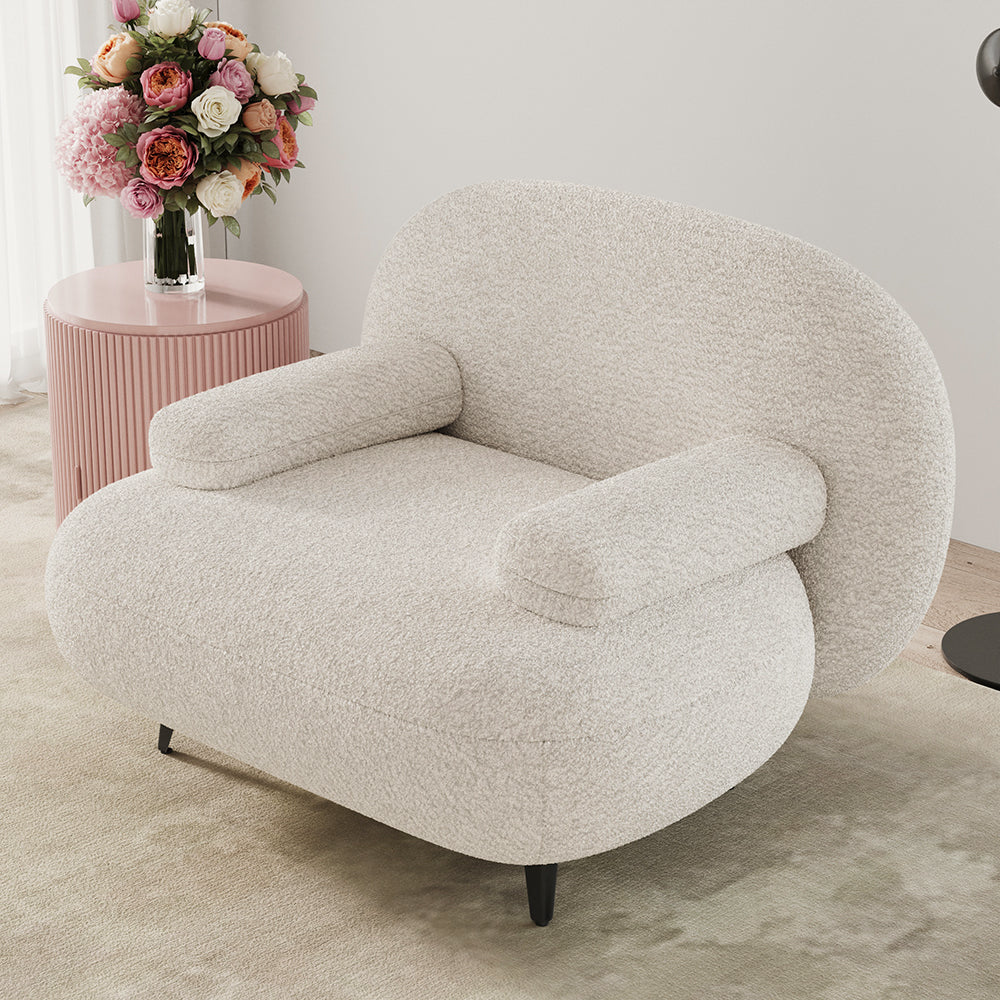 White cream boucle accent chair with matching pouf ottoman for modern lounge seating
