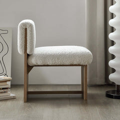 White and natural wood accent chair with boucle sherpa upholstery for cozy living spaces