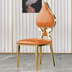 Elegant dining chair with golden legs and poker-style design, featuring durable PU leather for a luxurious touch