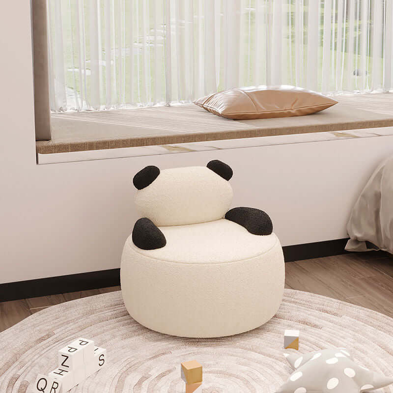 Off-white boucle sherpa bear accent chair with black and brown details, cozy lounge sofa seating