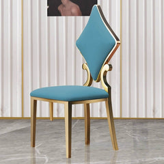 Luxurious dining chair with golden legs and poker-style design, crafted from durable PU leather for a stylish touch