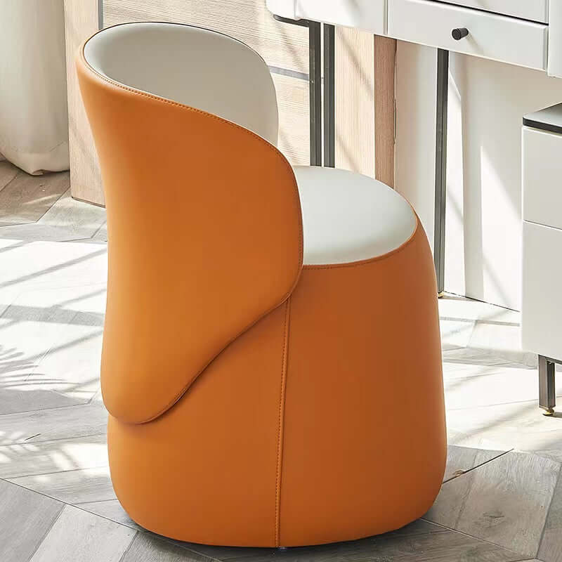 Pink Nordic swivel vanity stool with low back and PU leather upholstery