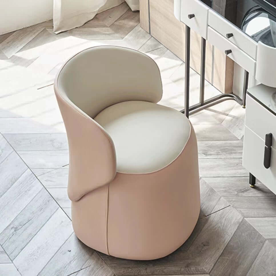 Pink Nordic swivel vanity stool with low back and PU leather upholstery