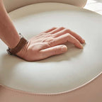 Pink Nordic swivel vanity stool with low back and PU leather upholstery