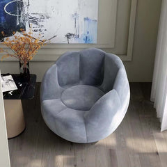 Chic blue chair with ergonomic design for luxurious home decor