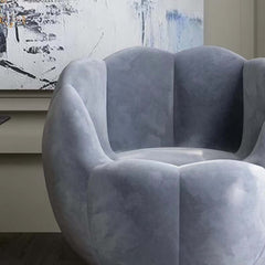 Stylish blue pumpkin moon pod chair for cozy reading nooks