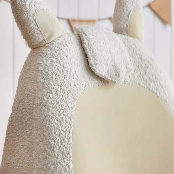 White children's boucle sherpa lounge chair with rabbit accent, cozy and stylish sofa