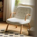 White and green lounge chair with boucle sherpa upholstery and solid wood armrests