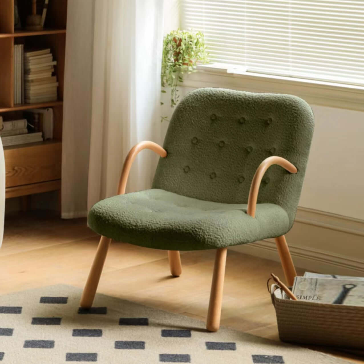 White and green lounge chair with boucle sherpa upholstery and solid wood armrests