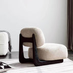 Light tan boucle sherpa lounge accent chair with wood base, modern and cozy design