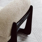 Light tan boucle sherpa lounge accent chair with wood base, modern and cozy design