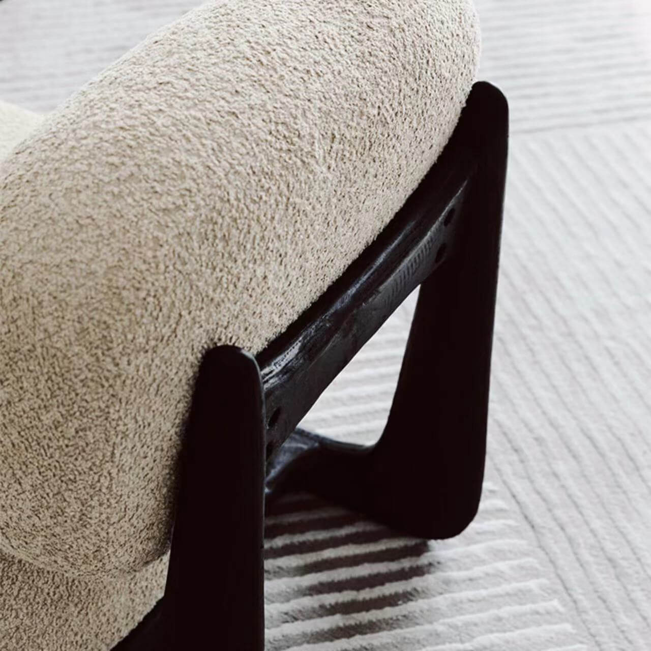 Light tan boucle sherpa lounge accent chair with wood base, modern and cozy design