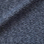 Light tan boucle sherpa lounge accent chair with wood base, modern and cozy design