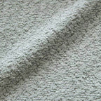 Light tan boucle sherpa lounge accent chair with wood base, modern and cozy design