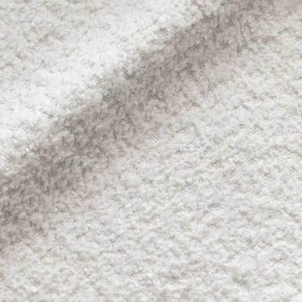 Light tan boucle sherpa lounge accent chair with wood base, modern and cozy design