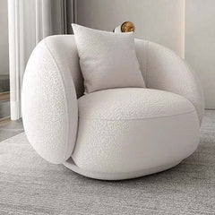 White modern accent chair with soft bouclé upholstery and cozy sherpa details