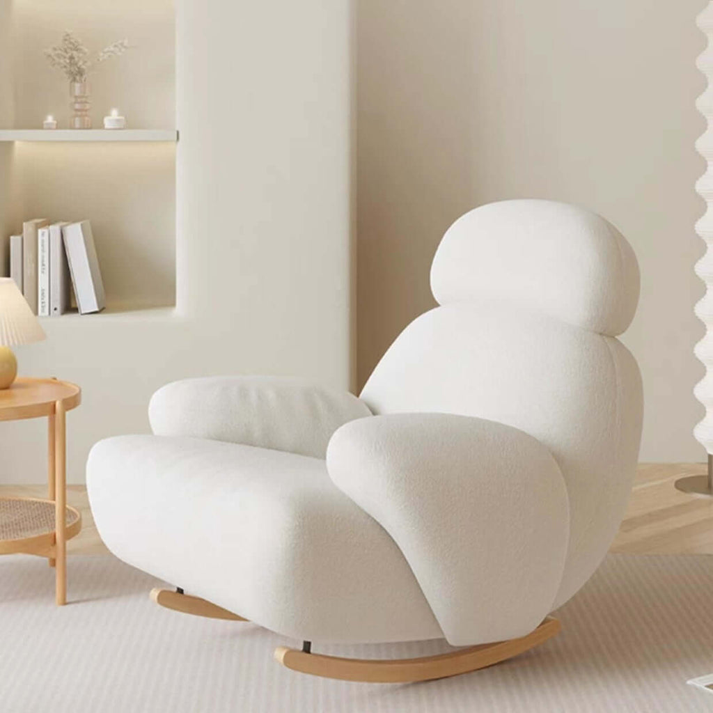 Nordic rocking lounge chair with white, gray, and pink boucle sherpa upholstery and solid wood base