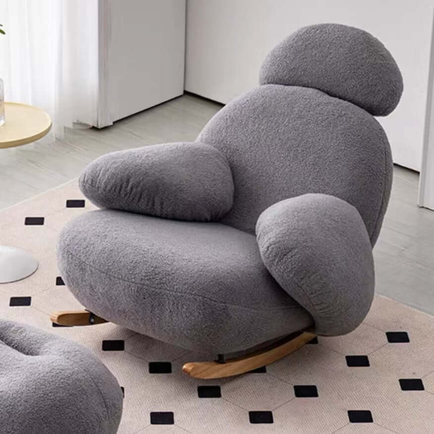 Nordic rocking lounge chair with white, gray, and pink boucle sherpa upholstery and solid wood base