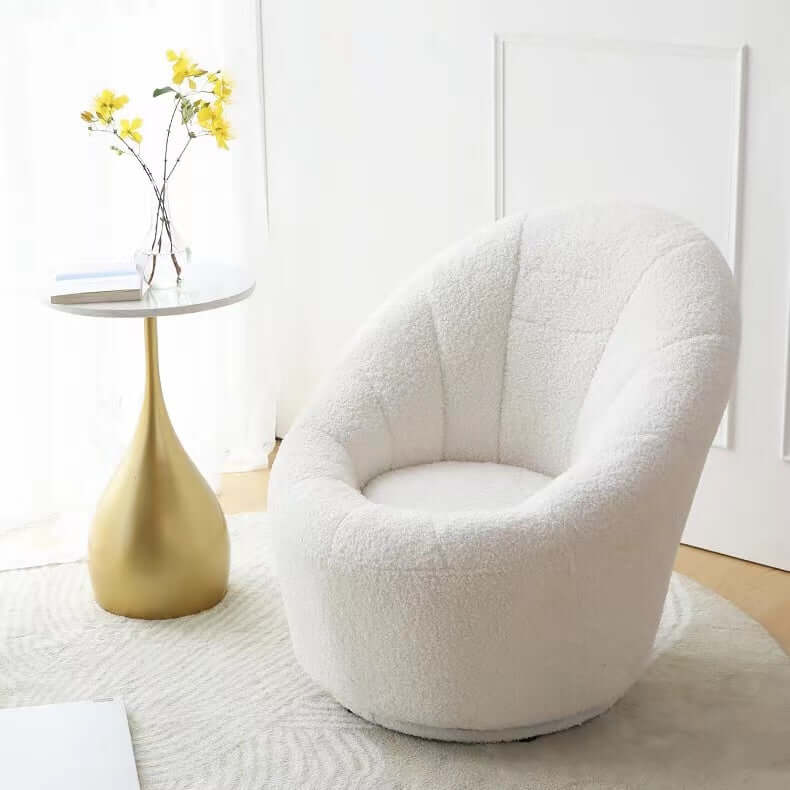 Yellow egg-shaped swivel boucle chair with sherpa upholstery, perfect as a lounge or vanity stool