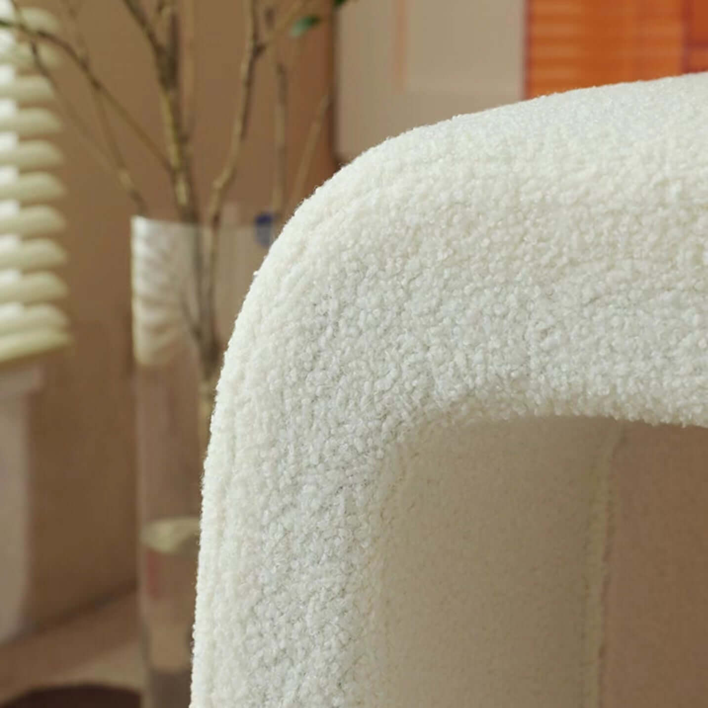 White boucle sherpa vanity stool without back featuring soft textured fabric