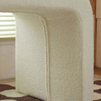 White boucle sherpa vanity stool without back featuring soft textured fabric