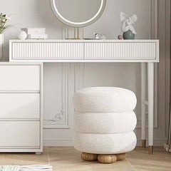 Chic round vanity stool perfect for adding a touch of elegance to your dressing area