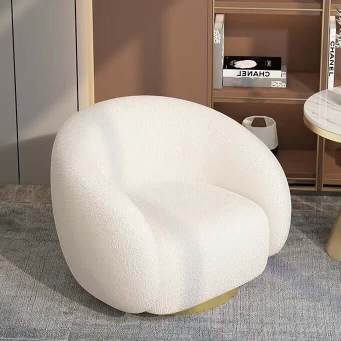 White boucle sherpa lounge chair with surrounding armrests for comfortable seating