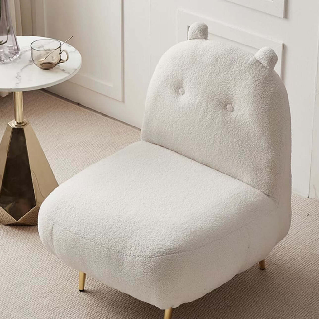 Luxurious Brown Boucle Accent Chair Featuring Elegant Golden Legs