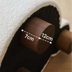 White and pink tripod accent chairs with wood legs and boucle sherpa upholstery