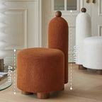 White and pink tripod accent chairs with wood legs and boucle sherpa upholstery