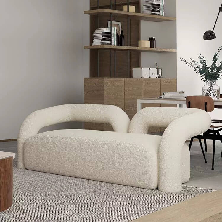 Modern curved sofa upholstered in boucle sherpa fabric with white, gray, yellow, pink, and Tiffany blue colors