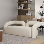 Modern curved sofa upholstered in boucle sherpa fabric with white, gray, yellow, pink, and Tiffany blue colors